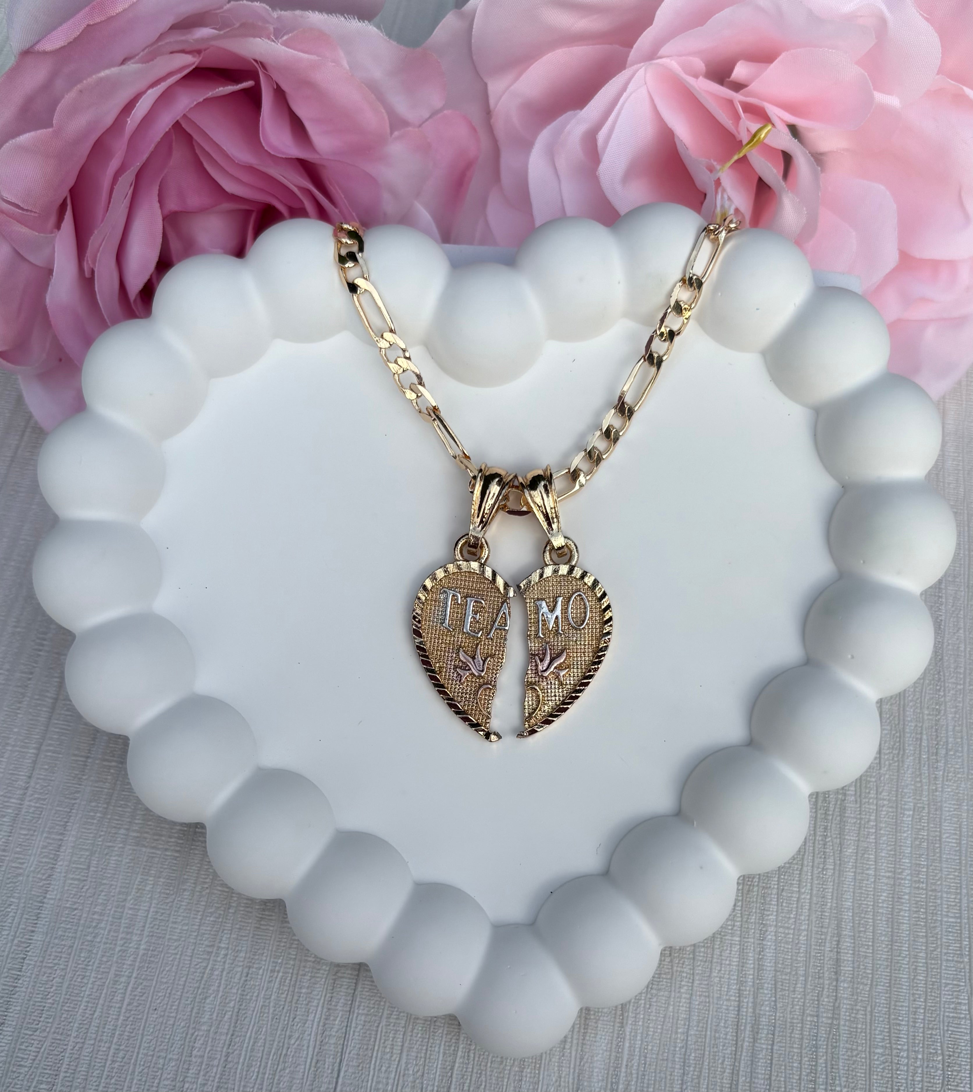 Te Amo Breakable Heart Necklace in gold, shown as one whole heart pendant with two chains